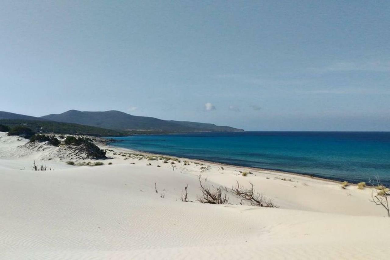 Casa Ludovica a Porto Pino Villa Esterno foto